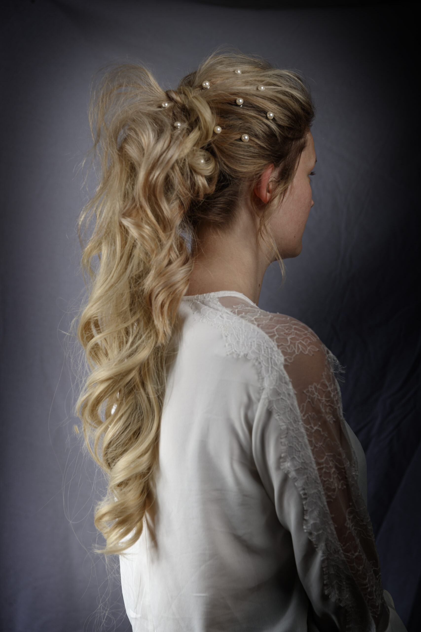 Long curled hair extensions